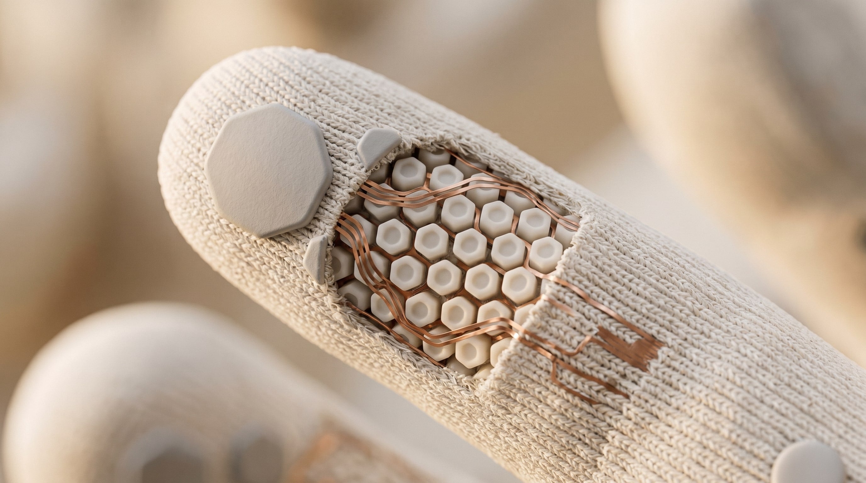Macro view inside a Talos Capture Glove fingertip: a hexagonal tactile sensor array with copper traces woven into the knit